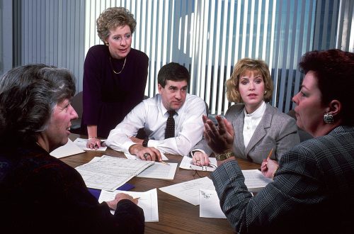 Business team discussing a beneficial ownership register for CIPC