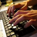 Entrepreneur typing to register a private company online in South Africa